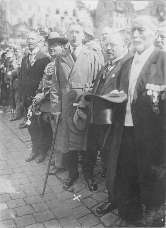 Adolf Hitler with Bavarian party members at a remembrance ceremony for former military forces in Nuremberg